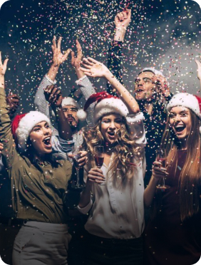 People dancing in Santa hats